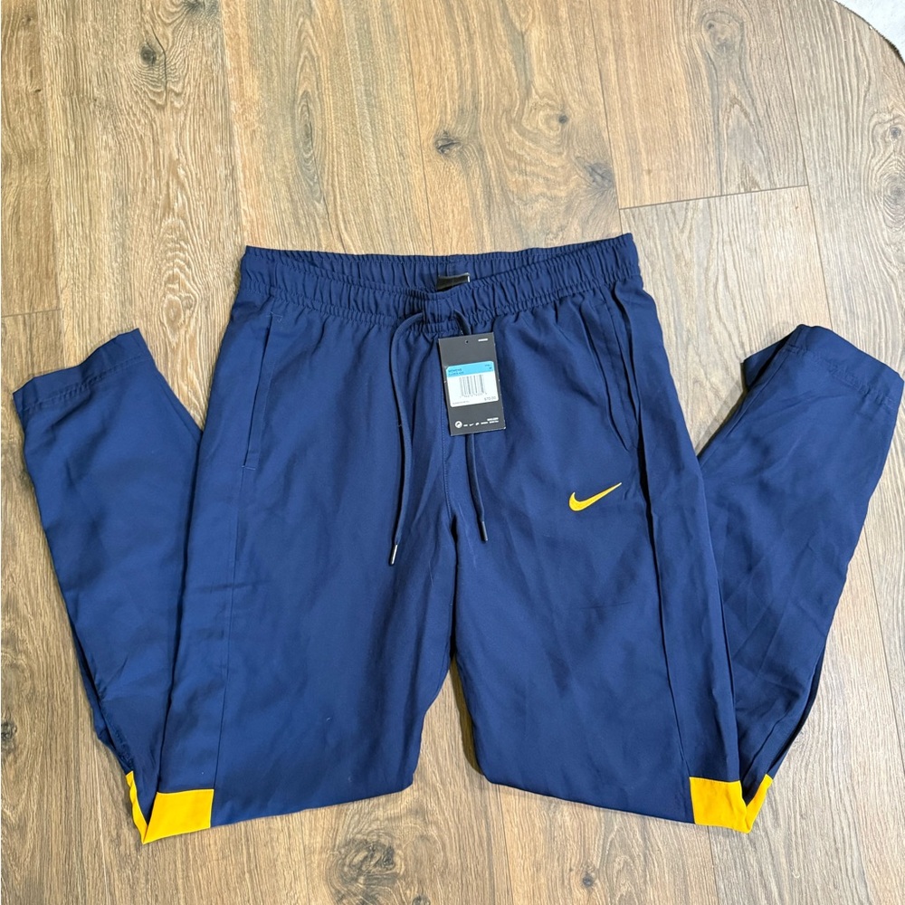Nike Navy Blue Track Pants with Yellow Accents